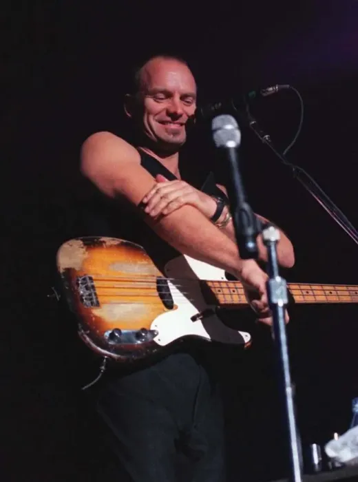 Framed Print : Sting rock singer on stage in Aberdeen commenting on how cold it is rubbing his arm with Framed Print : Sting rock singer on stage in Aberdeen commenting on how cold it is rubbing his arm with
