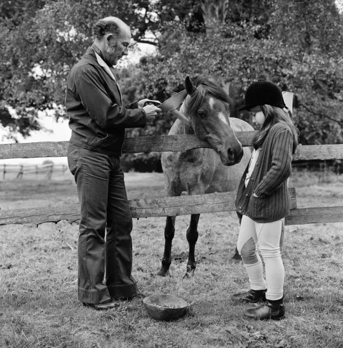 Framed Print : Stirling Moss and his daughter Allison (aged 7) with her horse Happy