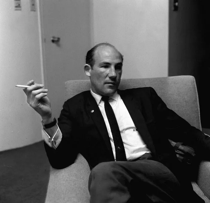 Framed Print : Stirling Moss in his London office May 1964