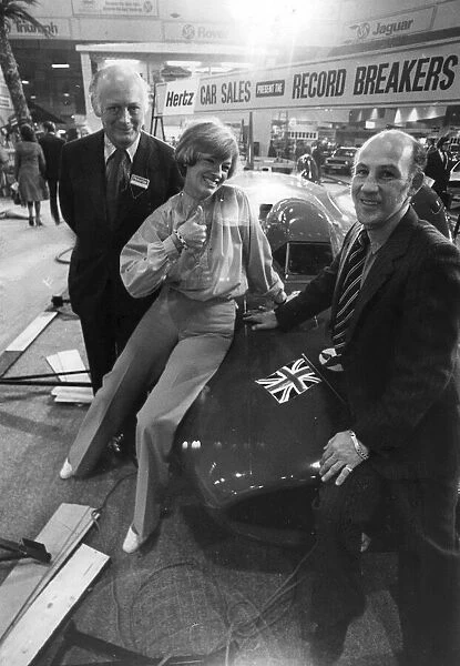 Stirling Moss with Lord MOntagu and Tania Bern at motor show - october 1977