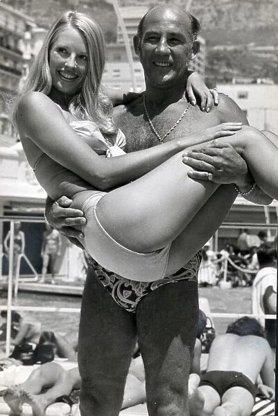 Stirling Moss and model Liz Hooley in Monte Carlo - June 1973