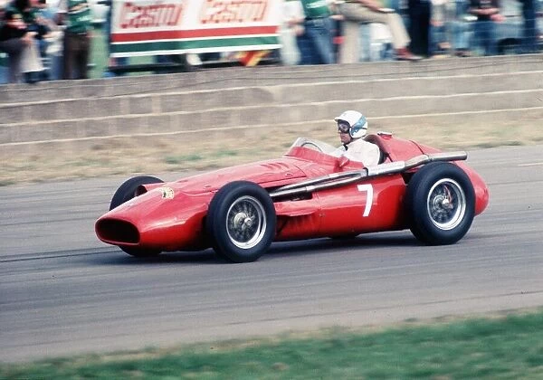 Stirling Moss racing in a Maseratti at Brands hatch