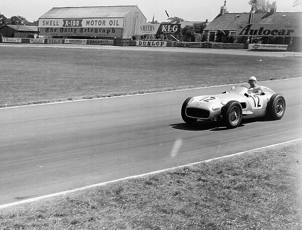 Stirling Moss winner of the British Grand Prix at Aintree in Liverpool 1955