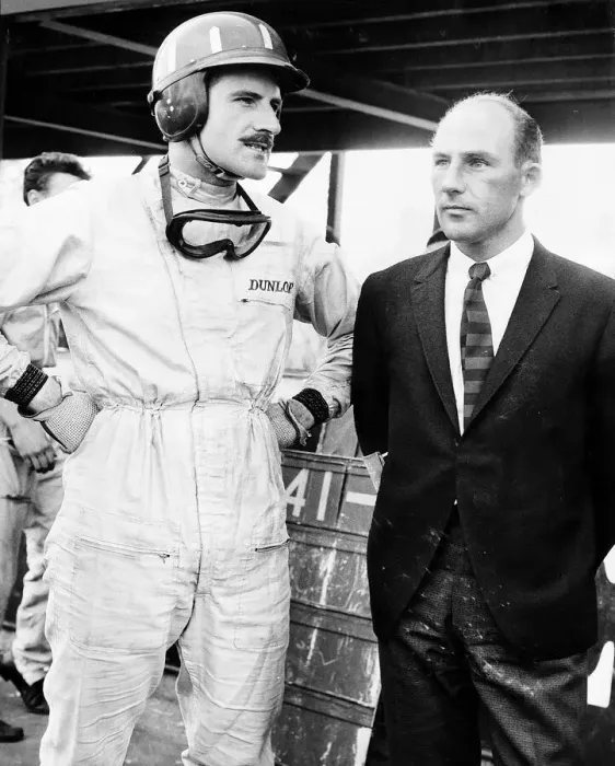 Framed Print : Stirlling Moss ex-racing driver with Graham Hill at Oulton Park Nov 1965 A©Mirrorpix Framed Print : Stirlling Moss ex-racing driver with Graham Hill at Oulton Park Nov 1965 A©Mirrorpix