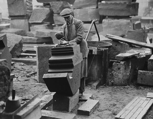 A stonemason working on a detail of the Anglican Cathedral, Liverpool