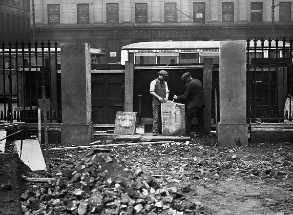 Stonemasons at work in Manchester. 15th March 1932