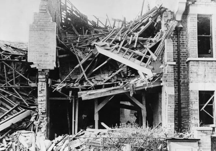 Framed Print : A two storey house was brought down by explosives to reproduce the collapse caused by a Framed Print : A two storey house was brought down by explosives to reproduce the collapse caused by a