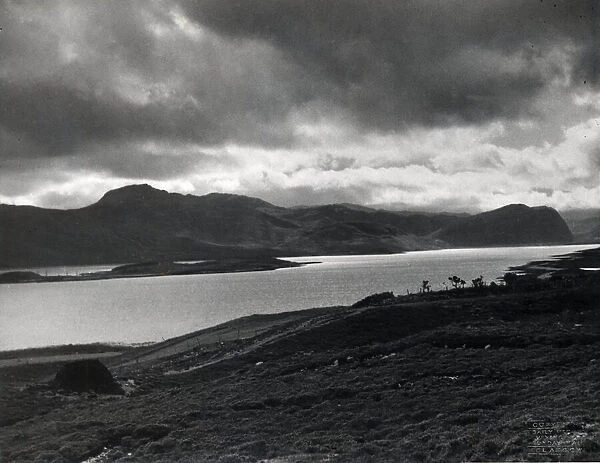 Storm clouds gather above Loch Eriboll, a sea loch on the north coast of Scotland