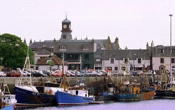 STORNOWAY general view of town and harbour fishing boats