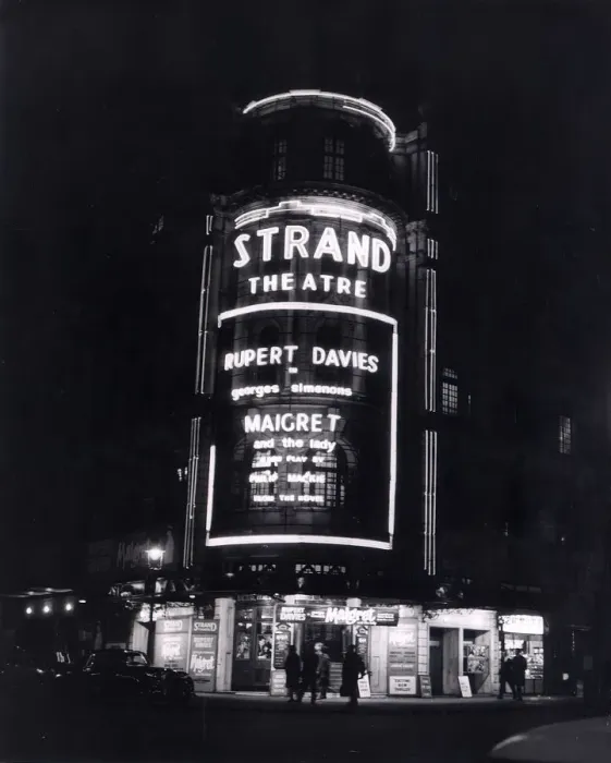 Framed Print : The Strand Theatre London is lit up at night in Neon Lights to advertise the Play Framed Print : The Strand Theatre London is lit up at night in Neon Lights to advertise the Play