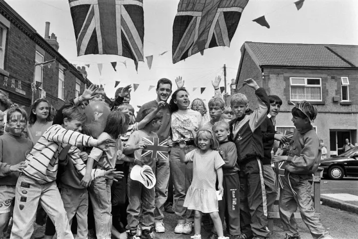 Framed Print : A street party held for British cyclist Chris Boardman following his return home from