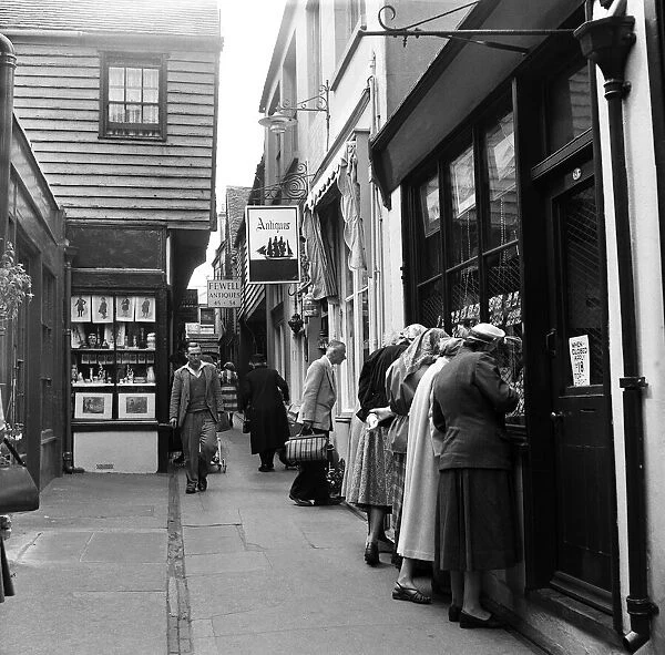 Street scenes in Brighton, East Sussex. August 1954