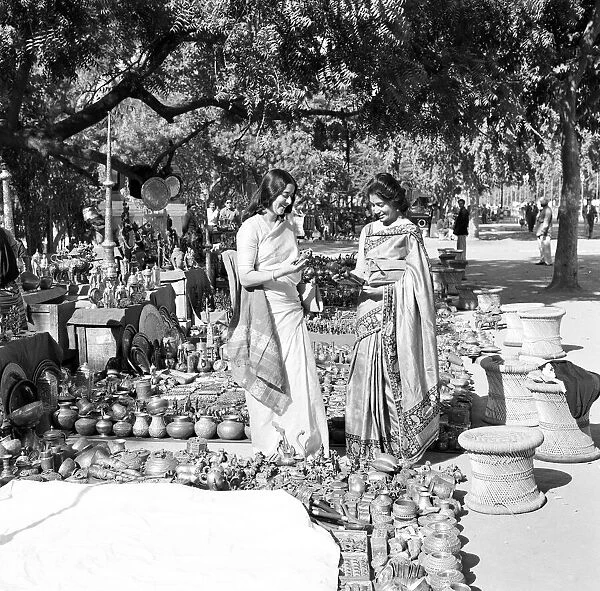 Street scenes, New Delhi, India, January 1961. Two women enjoy a day out