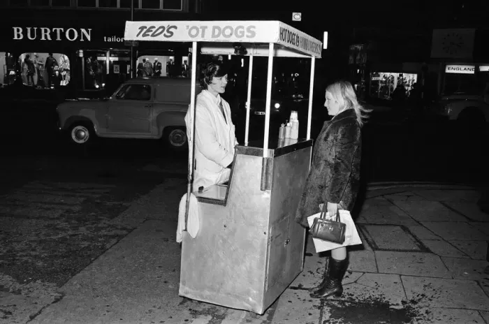 Framed Print : Street trader selling hot dogs. Birmingham, West Midlands. 20th November 1970 Framed Print : Street trader selling hot dogs. Birmingham, West Midlands. 20th November 1970