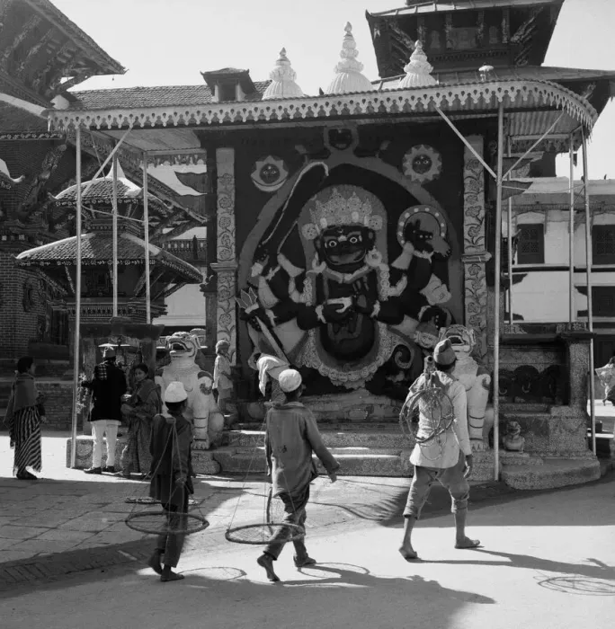 Framed Print : Street traders pass the entrance to the Pashupatinath Temple Kathmandu Nepal Framed Print : Street traders pass the entrance to the Pashupatinath Temple Kathmandu Nepal