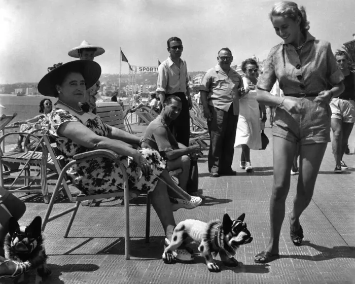 Framed Print : Strollers on the Promenade Des Anglais get a shock of their lives while walking past an