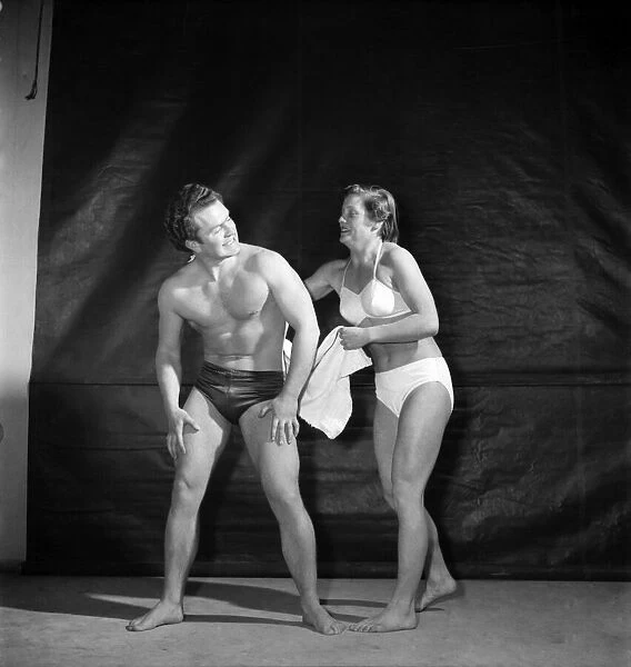Strong Man Act. Brenda Armitage and Walter McCullan. March 1952 C1617-001