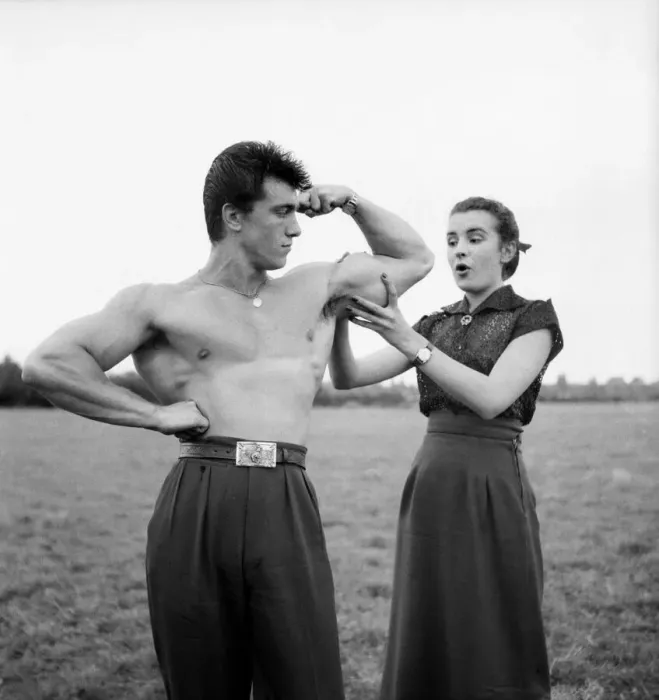 Framed Print : Strongman Spencer Churchill seen here posing by the Pool with Gloria Wagdin