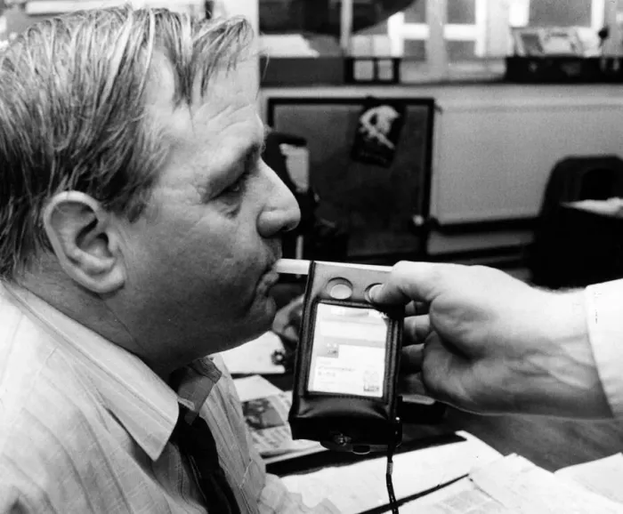 Framed Print : Stuart Minton, News Editor, South Wales Echo Newspaper, tries out a breathalyser test Framed Print : Stuart Minton, News Editor, South Wales Echo Newspaper, tries out a breathalyser test