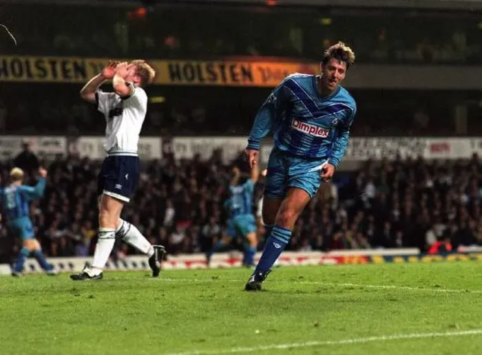  : Stuart Nethercote holds his head after Le Tissier celebrates his goal after Stuarts