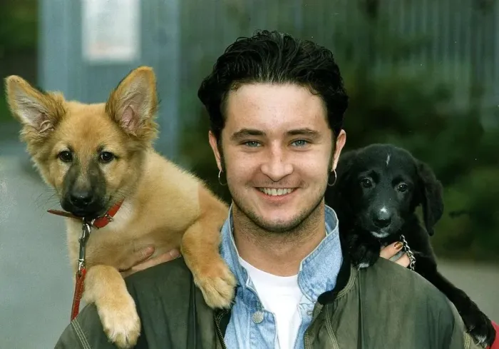 Framed Print : Stuart Wolfenden Actor with the two dogs he rescued from oldham RSPCA Named Tango Framed Print : Stuart Wolfenden Actor with the two dogs he rescued from oldham RSPCA Named Tango