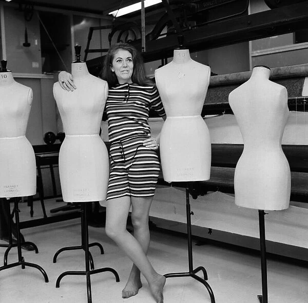 A student at the Art School, Birmingham, wearing designs by some of the students