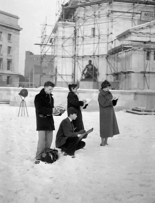: Four students from the Birmingham College of Art and Crafts stand sketching at the Civic : Four students from the Birmingham College of Art and Crafts stand sketching at the Civic