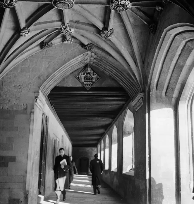 Framed Print : Students and professors walk through the corridors of one of the colleges of Oxford Framed Print : Students and professors walk through the corridors of one of the colleges of Oxford