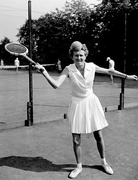 One of the students at Westhill College playing tennis. July 1957