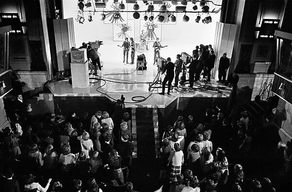 Studio scene shot from above during a live BBC recording of The Beatles in 1964