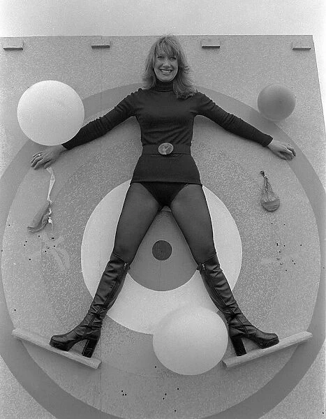 Stunts 1977 Crackshot - or is he?, Christina Good, raises a laugh as the balloons burst