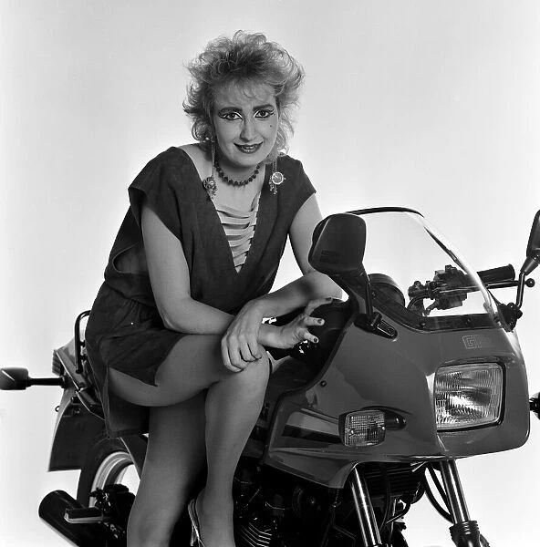Su Pollard, pictured with a motorbike. January 1984