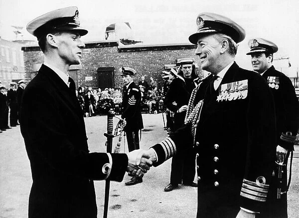 Sub-Lieutenant David Bingham (l) receives the sword of honour in 1970 two years before