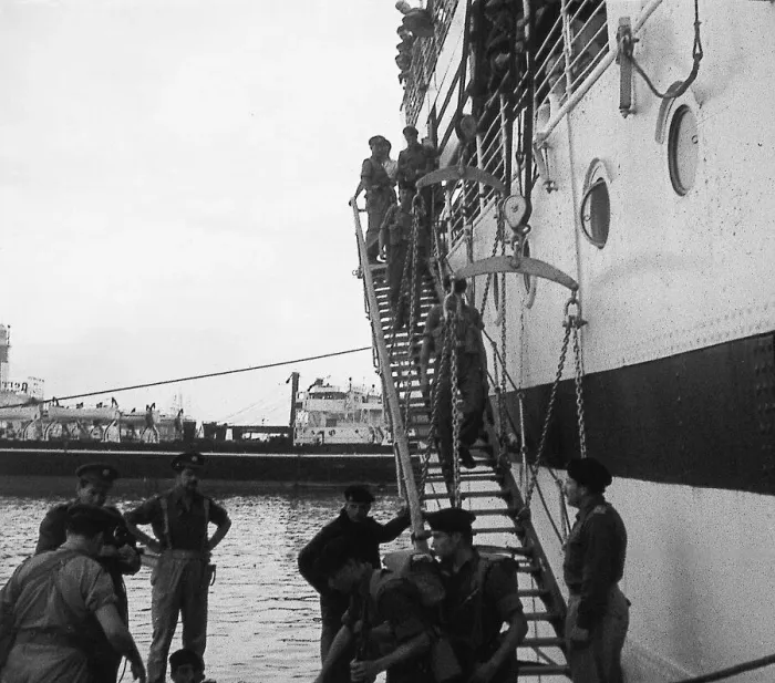Framed Print : Suez Crisis 1956 British coming ashore in Port Said (date may be incorrect)