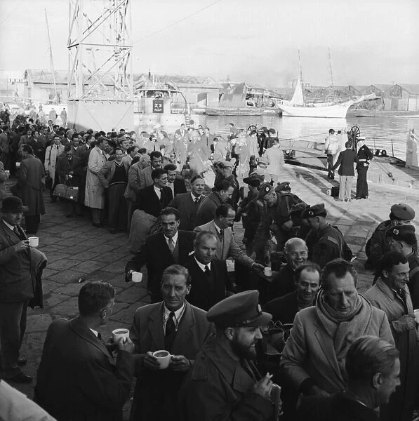 Suez Crisis 1956 British evacuees who have been brought from Cairo line up for a
