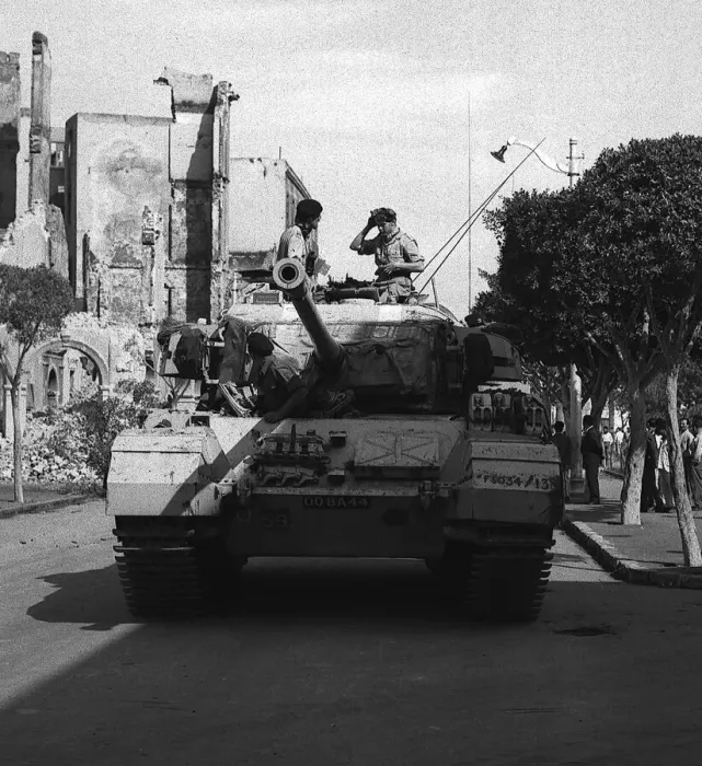 Framed Print : Suez Crisis 1956 A Centurion tank lends support to Commando troops who are carrying Framed Print : Suez Crisis 1956 A Centurion tank lends support to Commando troops who are carrying
