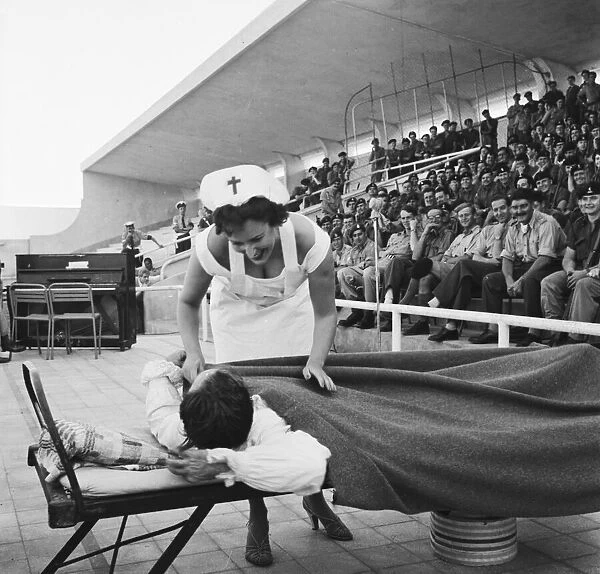 Suez Crisis 1956 Commedian Danny O Dea assisted by 'nurse'