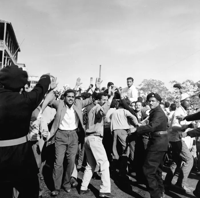 Framed Print : Suez Crisis 1956 Crowds of angry Egyptians are held back by police as United