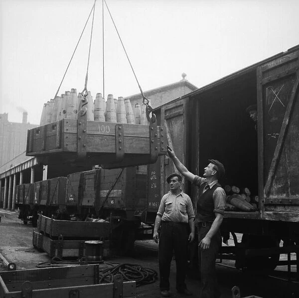 Suez Crisis 1956 Dockers putting 80lb shells into crates marked '