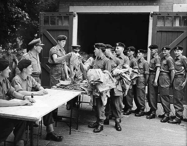 Suez Crisis 1956 Men of the Royal Berkshire Regiment are issued with tropical kit
