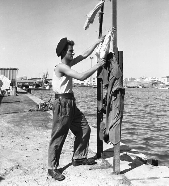 Suez Crisis 1956 Private Joe Lovelock of the Pioneer Corps hanging out the washing