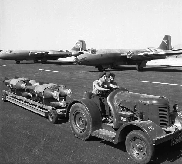 Suez Crisis 1956 RAF ground crew loading bombs onto Canberras on an airfield in