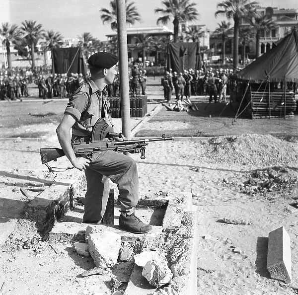 Suez Crisis 1956 Sapper R Griffenof Cardiff stands guard with his Bren gun as