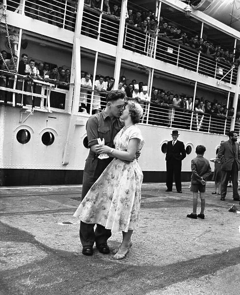 Suez Crisis 1956 Soldier kisses his girlfriend goodby before embarking