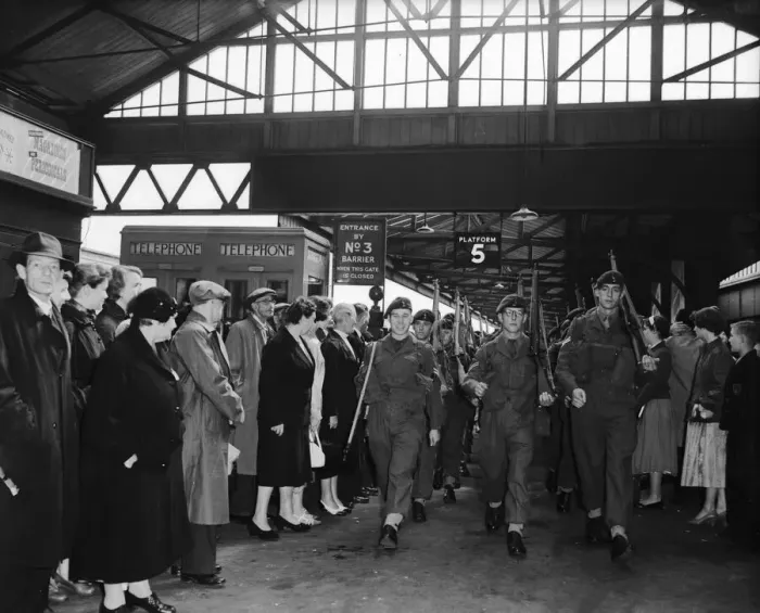 Framed Print : Suez Crisis 1956 Troops march form Portsmouth Train Station to the docks where they Framed Print : Suez Crisis 1956 Troops march form Portsmouth Train Station to the docks where they