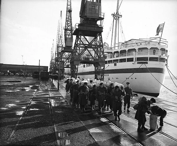 Suez Crisis 1956 Troops walking along quay after having disembarked from '
