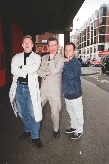 Framed Print : Suggs, lead singer of British ska group Madness, with two members of the group posing for Framed Print : Suggs, lead singer of British ska group Madness, with two members of the group posing for