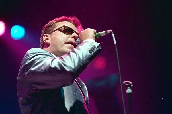 Suggs from Madness belts out a number at the Telewest Arena in Newcastle