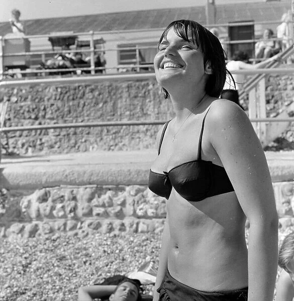Summer scenes at Bognor Regis, West beach. 16 year old student Inga enjoying
