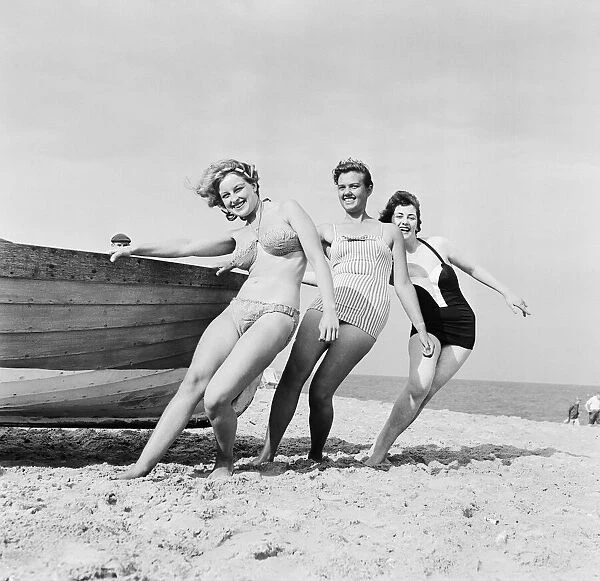 Sunday Pictorial Beach Contest at Great Yarmouth. The three prize winners left to